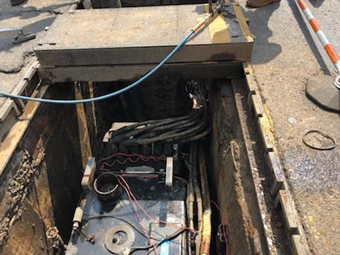 Top-down view into a network-transformer vault during inspection
