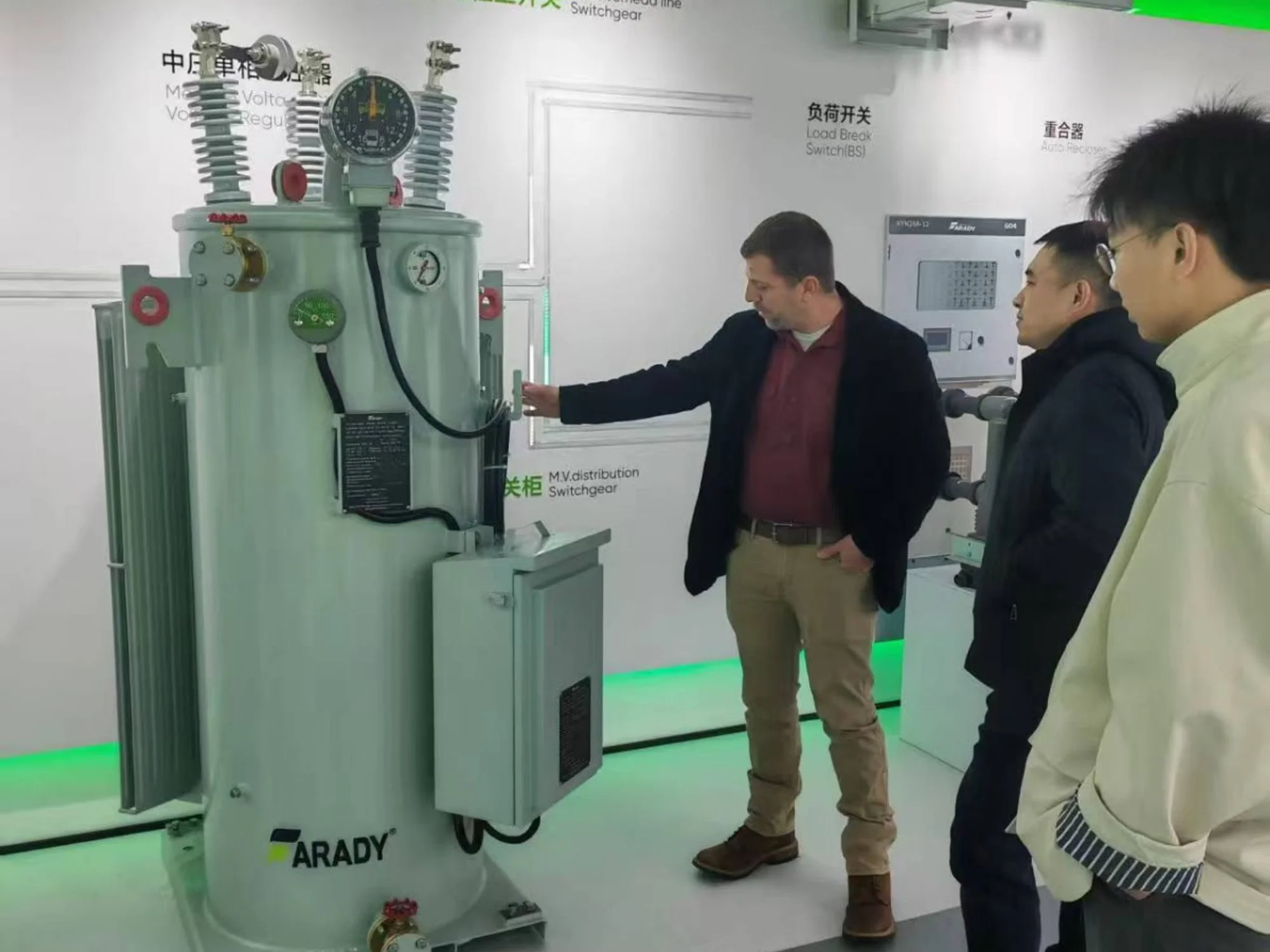 Principal reviewing distribution equipment at a manufacturer showroom
